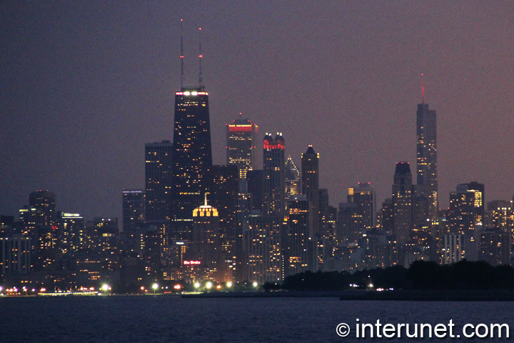 Chicago at night Night view on Chicago from Montrose harbor