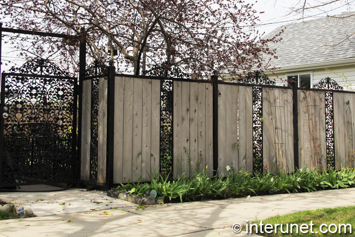 custom made fence combination-of-steel-and-wood-on-the-fence