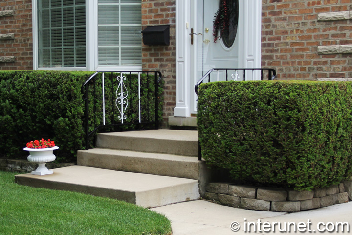 simple-concrete-porch-with-metal-balustrades