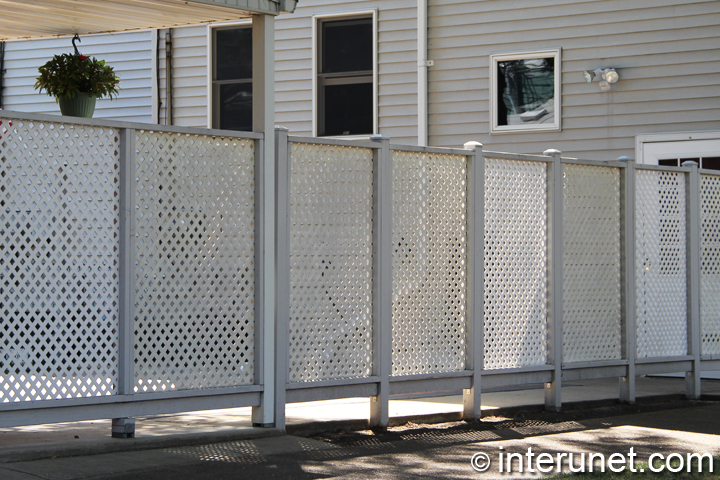 simple-lattice-wood-fence-painted-white