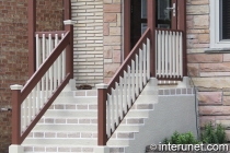 combination-of-concrete-porch-with-wood-railing