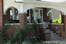 covered-brick-porch-with-arches