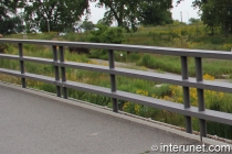 horizontal steel fence on the bridge