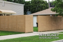 horizontal-wood-boards-fence-on-wooden-posts