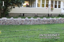 low-stone-fence-with-bigger-rocks-on-top