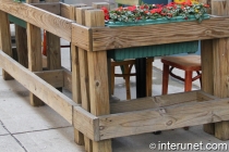 pressure treated lumber fence decorated with flowers