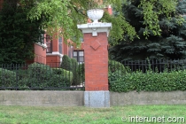 steel-fence-with-brick-pillars