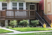 wood-front-porch-with-steel-stairs