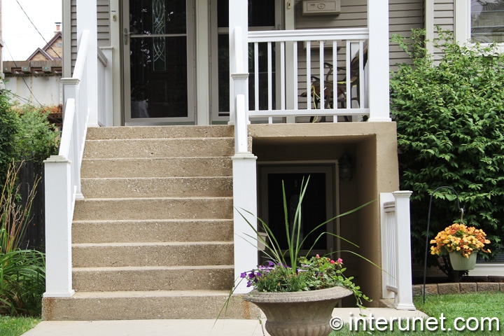 concrete-stairs-with-wood-railing