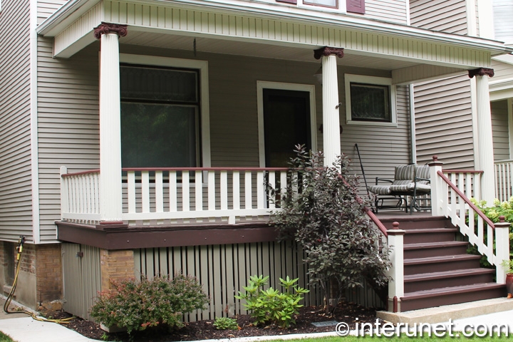 covered-front-porch-with-wood-stairs