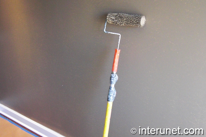 painting walls first-coat-of-paint-application