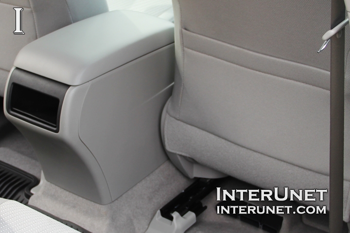 Center console center-console-auxiliary-rear-box-front-passenger-seat-pocket
