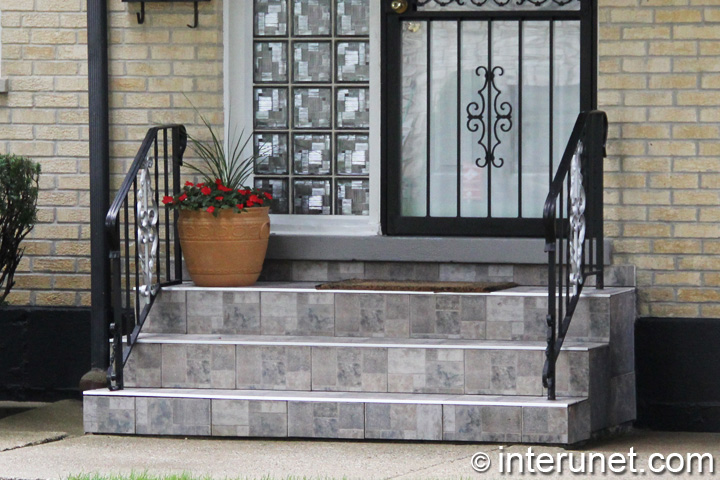 small porch tile-on-steps-and-small-porch