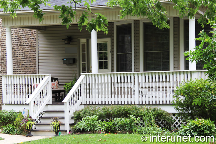 wood-front-porch-with-roof-on-columns