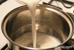 pouring-milk-into-the-pot