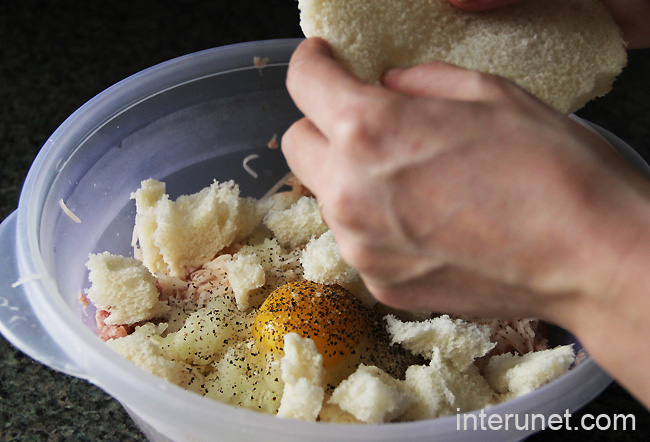 putting-bread-into-the-mixing-bowl