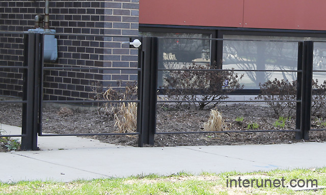 welded-steel-fence-with-gate-painted-black