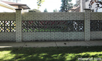  brick-fence-with-decorative-concrete-blocks 