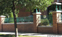 brick-fence-with-metal-sections