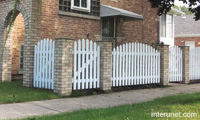brick-white-vinyl-fence