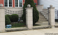 concrete-blocks-columns-metal-fence